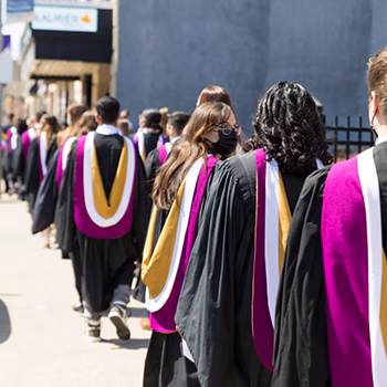 Graduates in gowns at convocation